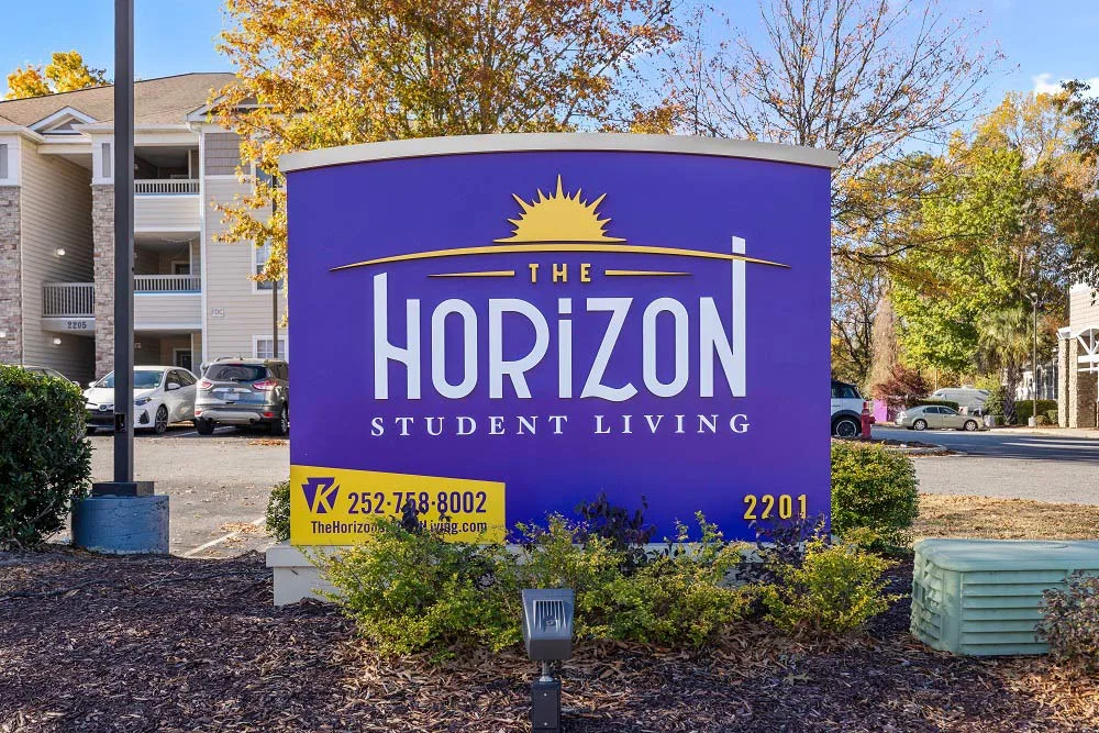 apartments near ECU greenville nc the horizon student living property sign at The Horizon